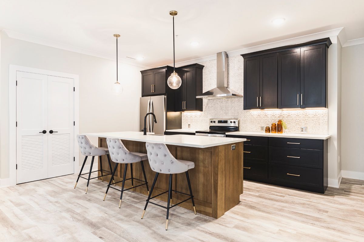 A living room filled with furniture and a fireplace.