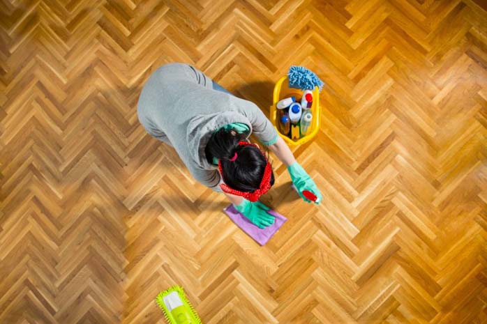 Woman Cleaning the Floor — Cleaning Services in East Syracuse NY