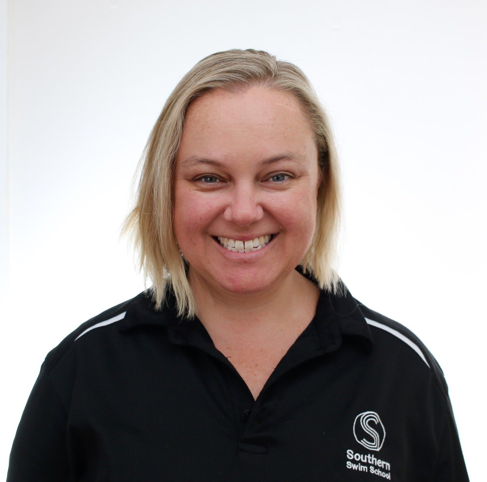 A woman wearing a black shirt with the word southern on it