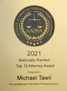A nationally ranked top 10 attorney award is presented to michael tawil