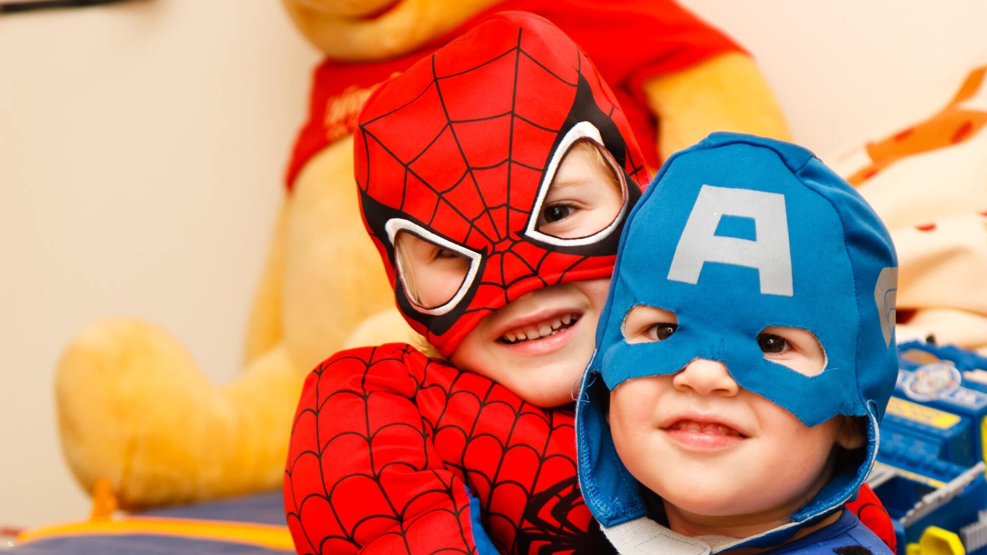 children's dressed as superheroes