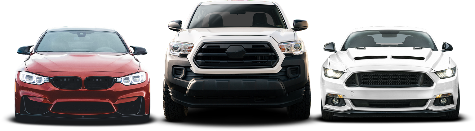 Three cars parked side-by-side: a red BMW, a white Toyota Tacoma pickup, and a white Ford Mustang.