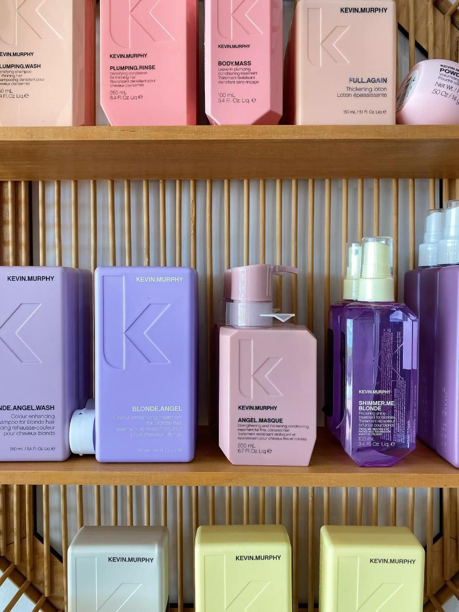 A Shelf Filled with Bottles of Shampoo and Conditioner β Apricate & Wild Salon in Airlie Beach, QLD