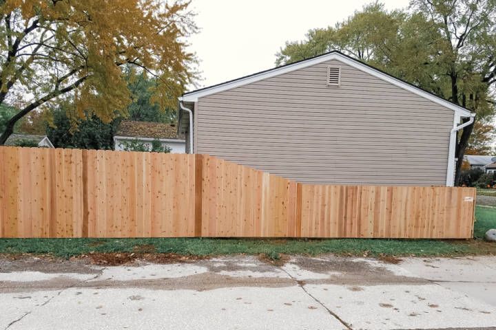 Cedar Solid-Board Fence With Dog-Eared Pickets — Warren, MI — Kimberly Fence & Supply