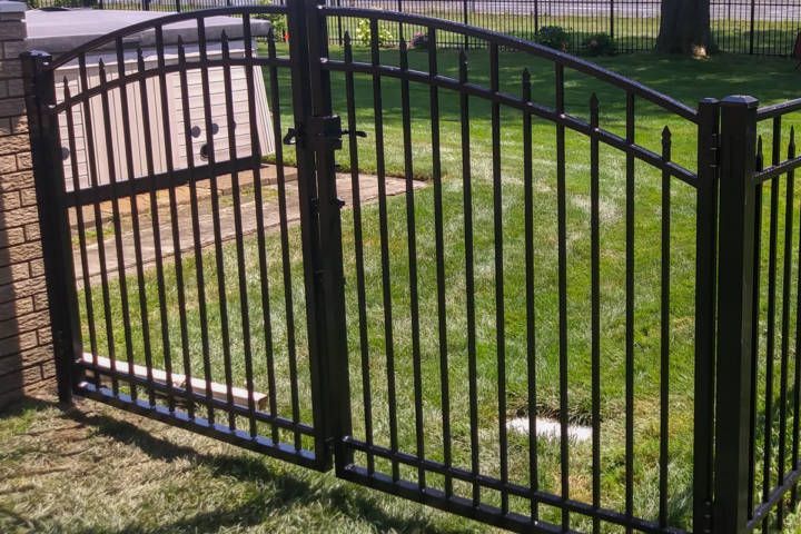 Aluminum Fence EFF 25 With Curved Top Gate In Clinton Township — Warren, MI — Kimberly Fence & Supply