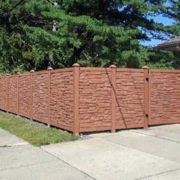 Brick Fence Along A Sidewalk Next To A House — Warren, MI — Kimberly Fence & Supply