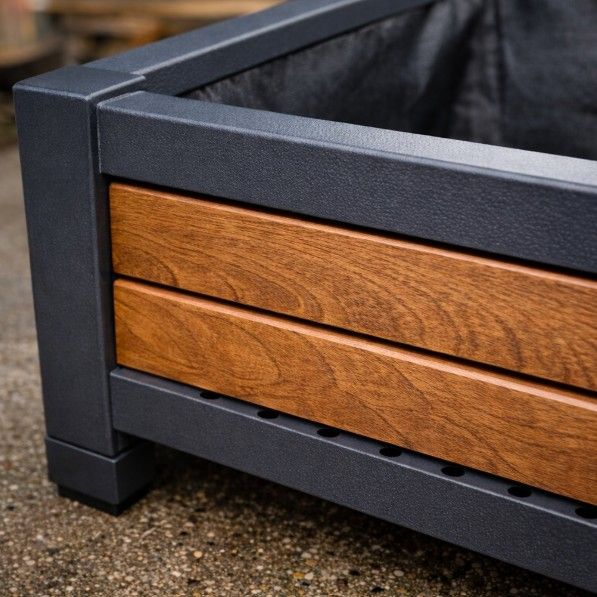 Construction detail of bespoke metal planter showing steel frame, timber panels, drainage holes and quality fabrication in Nottingham