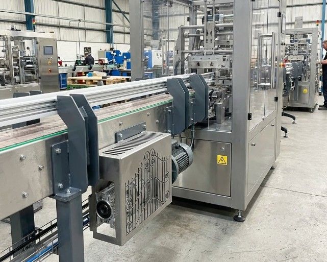 Custom precision metal brackets and components installed on industrial machinery in Nottingham manufacturing facility