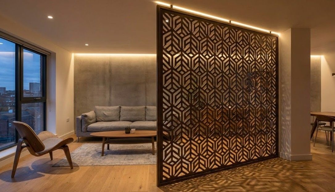 Decorative metal feature wall panel creating artistic room divider in contemporary Nottingham interior