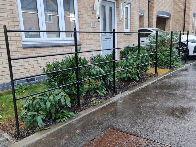 Nottingham Metalworksmetail railing in a forn tgarden in Nottingham