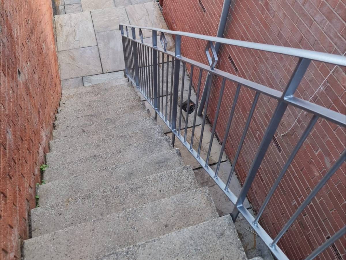 Nottingham Metalworks stainless steel outdoor handrail for concrete steps in Nottingham