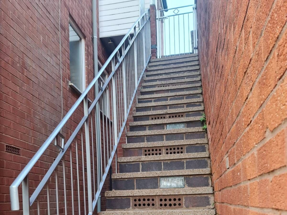 Nottingham Metalworks stainless steel handrail for outdoor steps in Nottingham