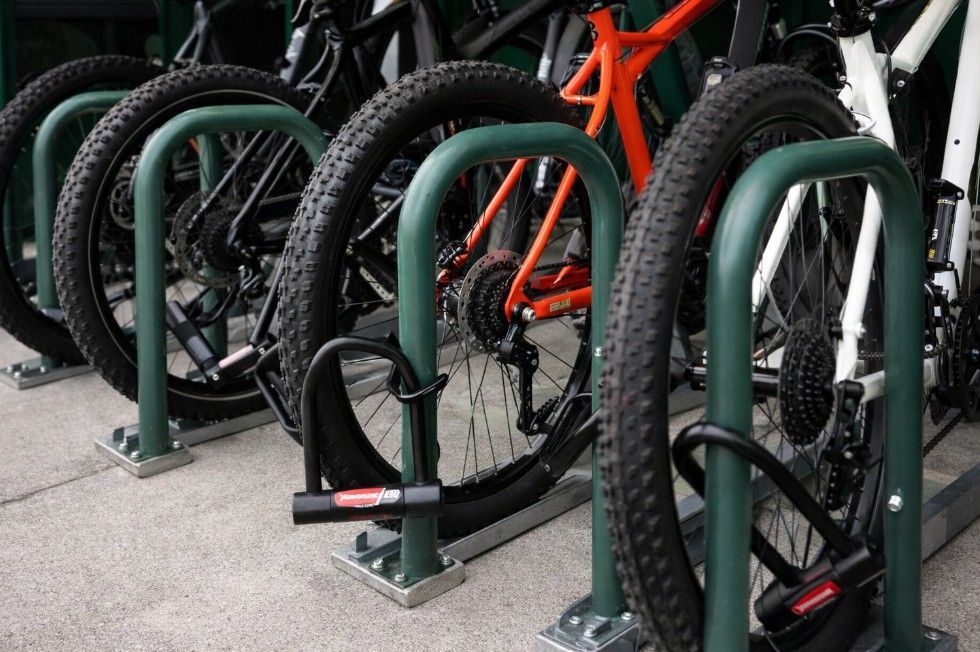 Close-up showing Sheffield stand installation and bikes secured using D-locks in Nottingham
