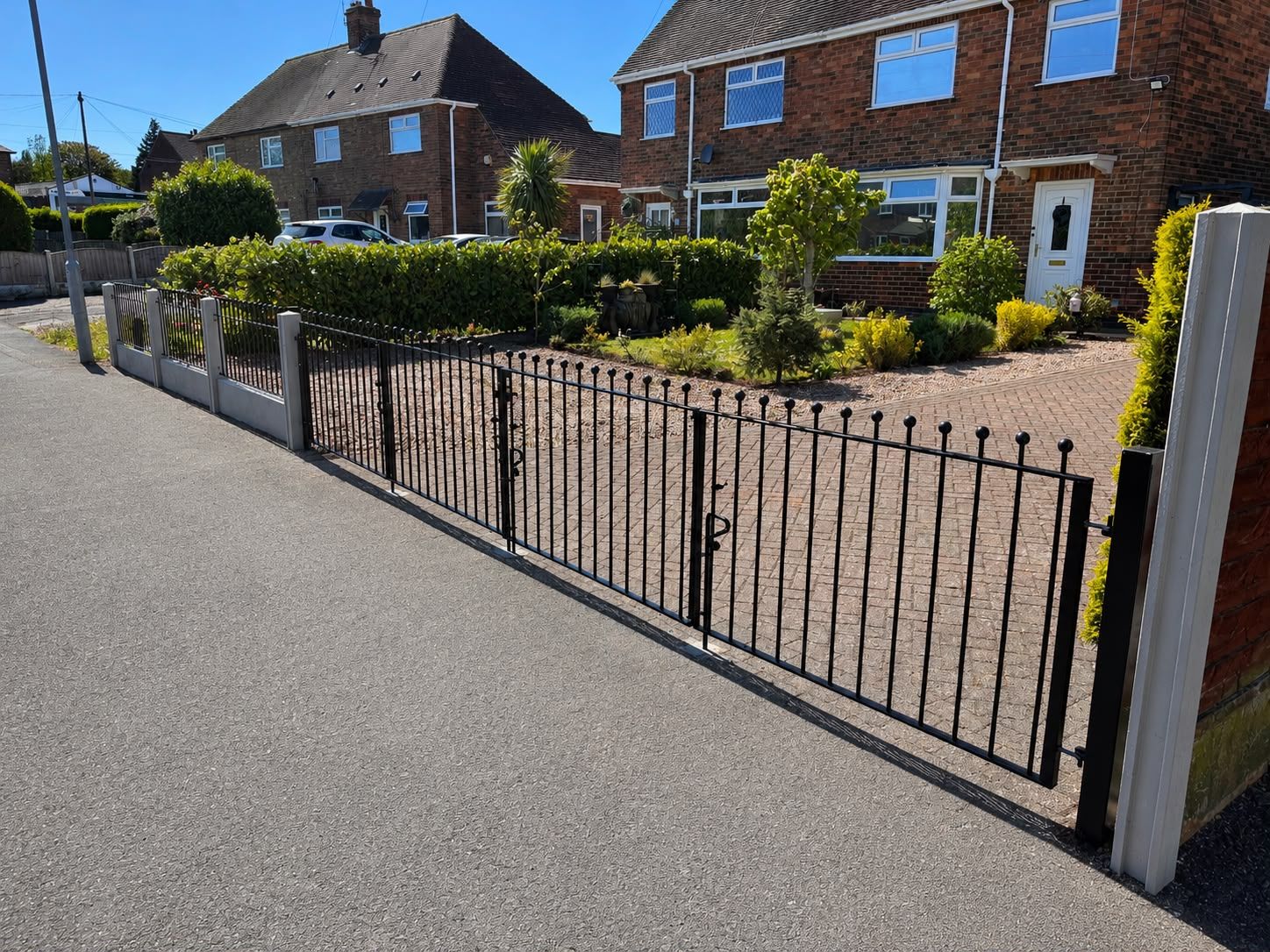 Nottingham Metalworks three foot hight metal driveway gates with matching metal railings installed in Nottingham