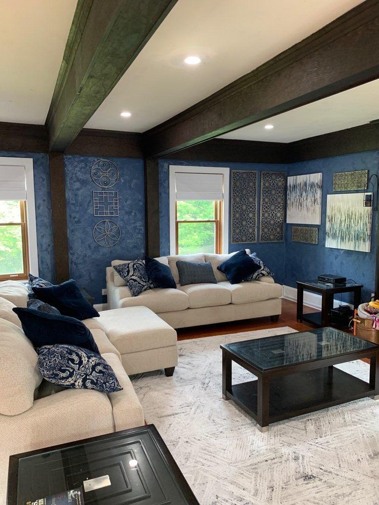 A living room filled with furniture and a coffee table.