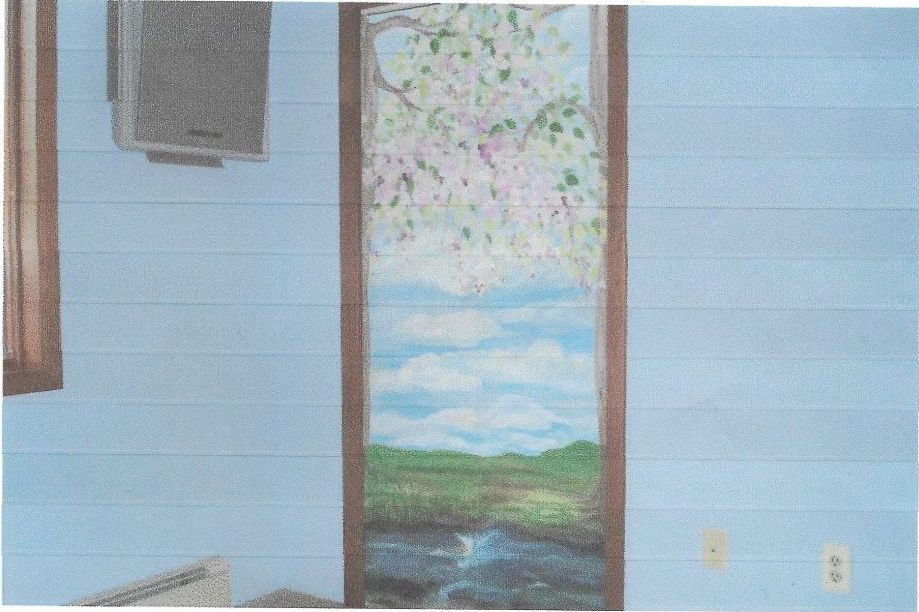 A close up of a colorful painting on a wall.