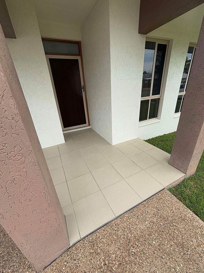 A White House With a Porch and a Door — Glittering Cleaning Service In Townsville, QLD