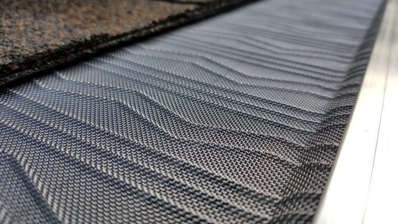 A close up of a piece of fabric with a pattern on it.