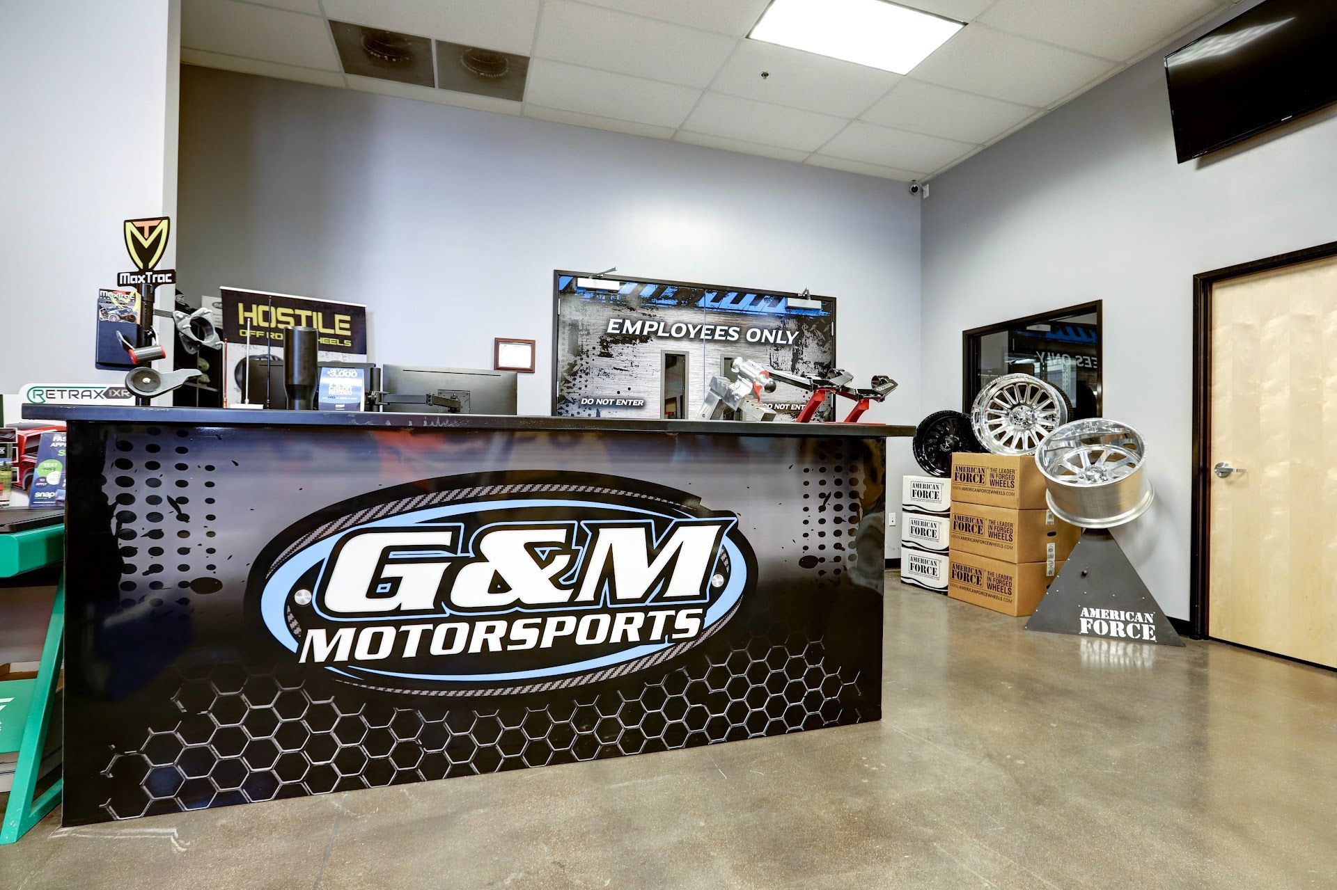 Reception Counter With G & M Motorsports Branding | G & M Motorsports