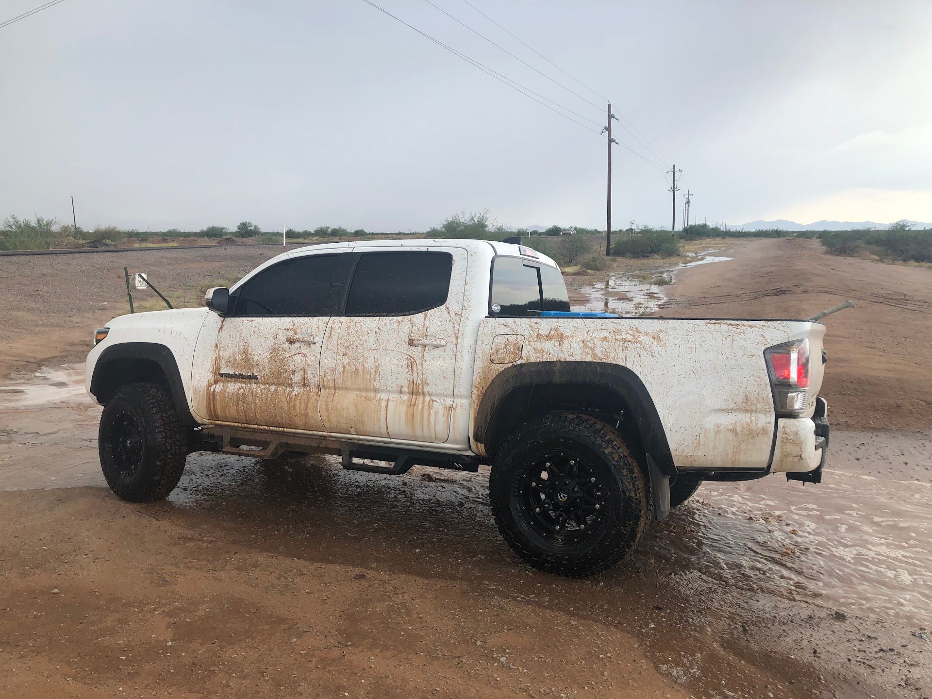 Muddy White Truck After Off-Road Drive | G & M Motorsports