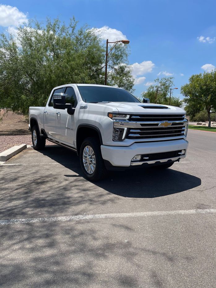 Silver Pickup Truck Parked Under Clear Blue Sky | G & M Motorsports