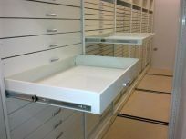 Pull out draws, museum archaeology. Mobile shelving, compactus, compactor