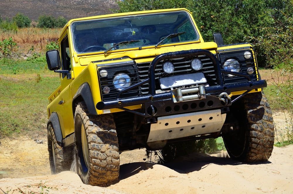 Yellow 4x4 Car In The Sand — Locqal Car Truck Trailer Rentals in Emerald, QLD