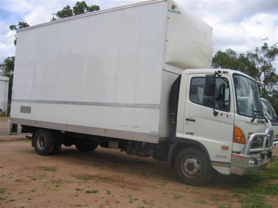 A White Box Truck is Parked on a Dirt Road — Locqal Car Truck Trailer Rentals in Emerald, QLD