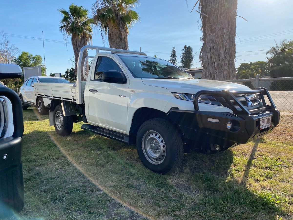 White And Silver Cars At The Parking Lot — Locqal Car Truck Trailer Rentals in Emerald, QLD