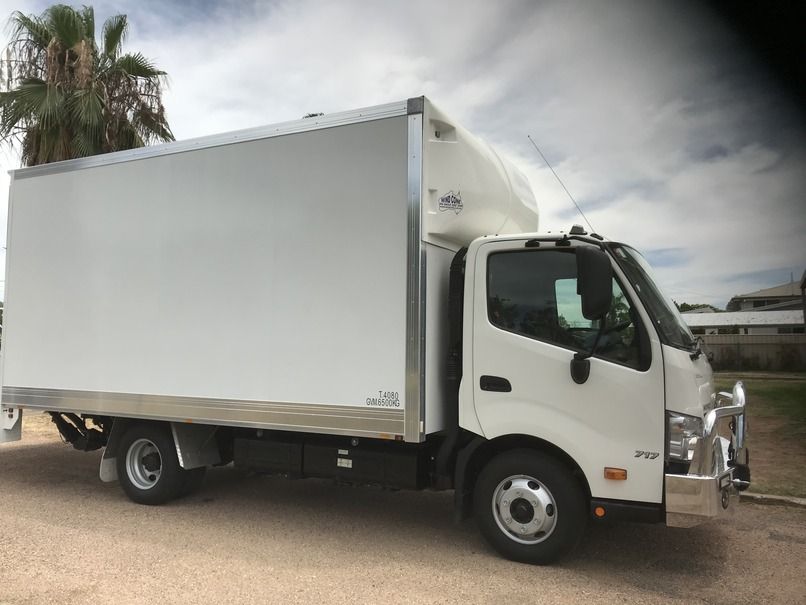 A White Truck is Parked on the Side of the Road — Locqal Car Truck Trailer Rentals in Emerald, QLD
