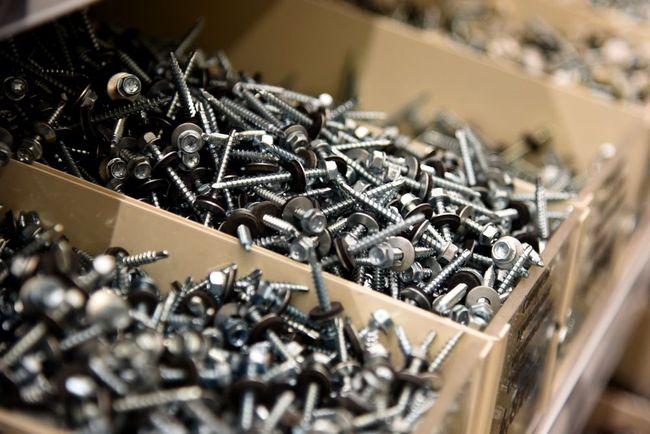 there are many different types of screws in the boxes .