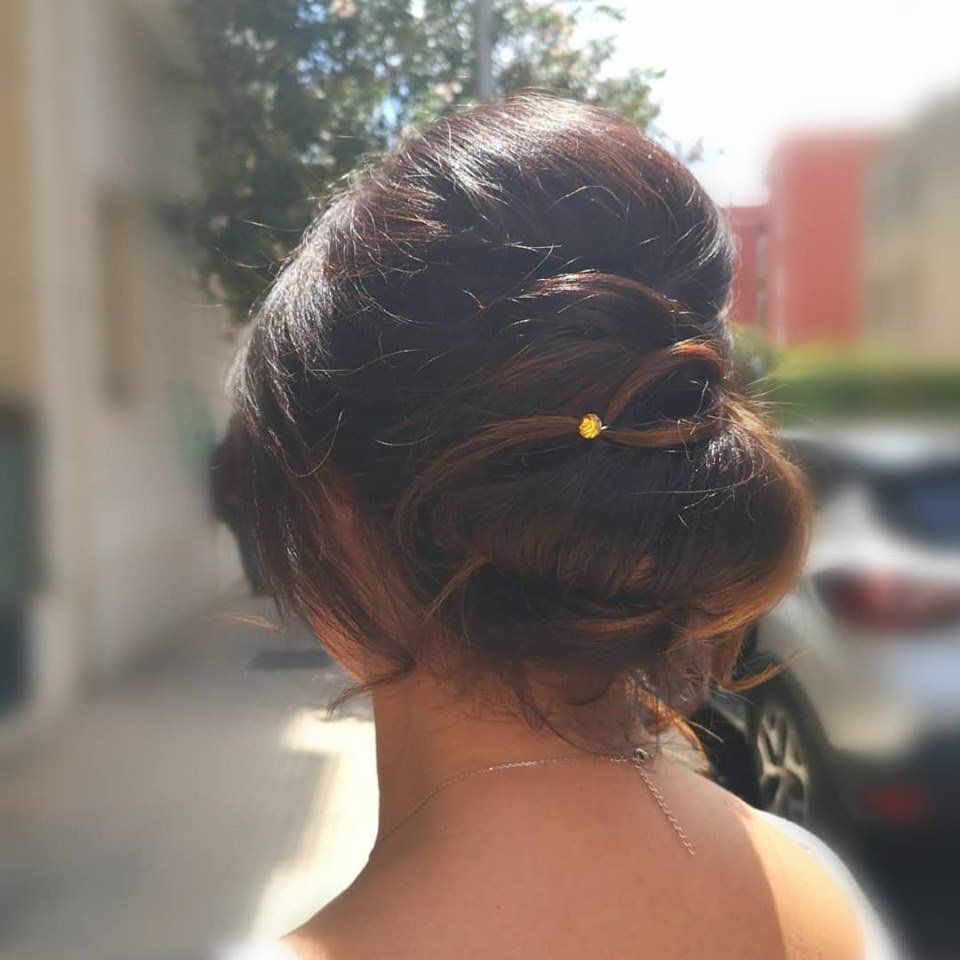 Acconciatura raccolta capelli lunghi