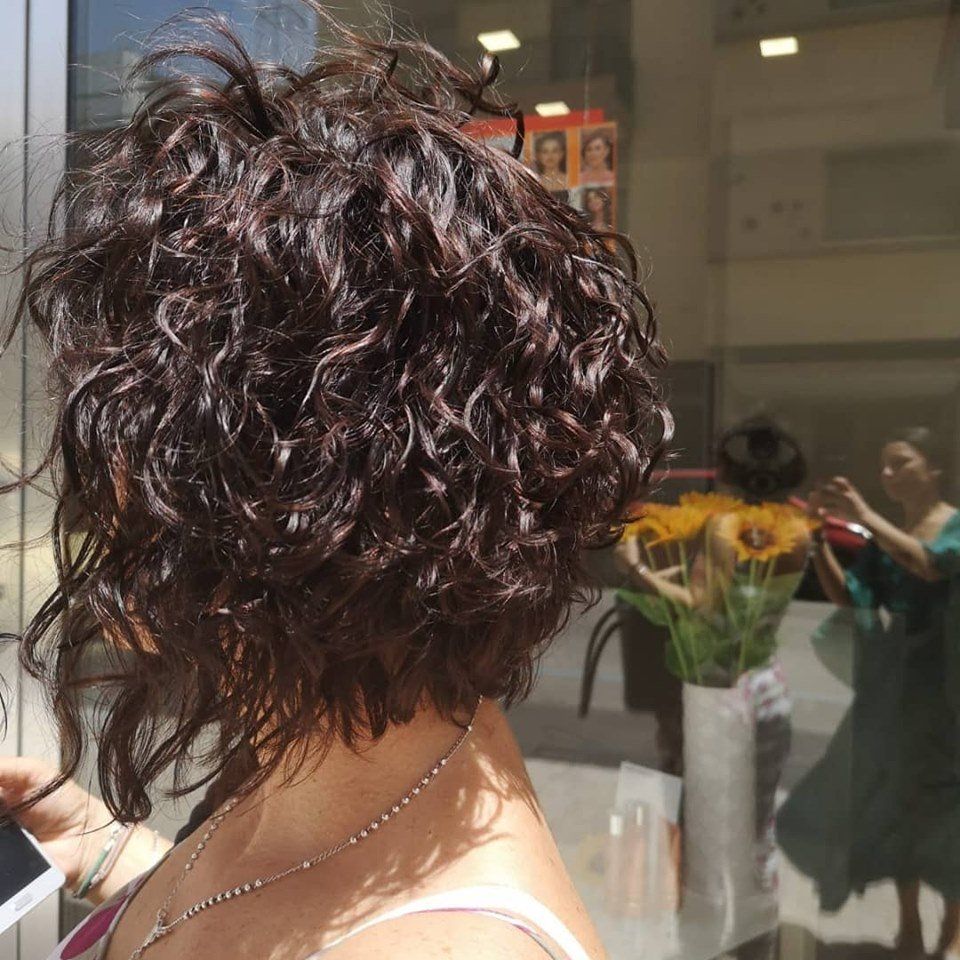 Taglio capelli bob riccio