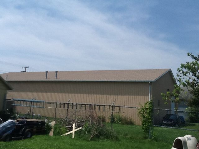Commercial Building With Old Shingle Roof — Hudson, MI — D & C Roofing
