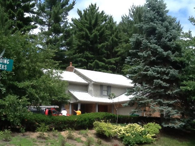 Roofers Preparing To Install New Roof — Hudson, MI — D & C Roofing
