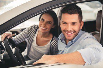 Couple Smiling Inside the Car - Insurance Company in Kingsport, TN