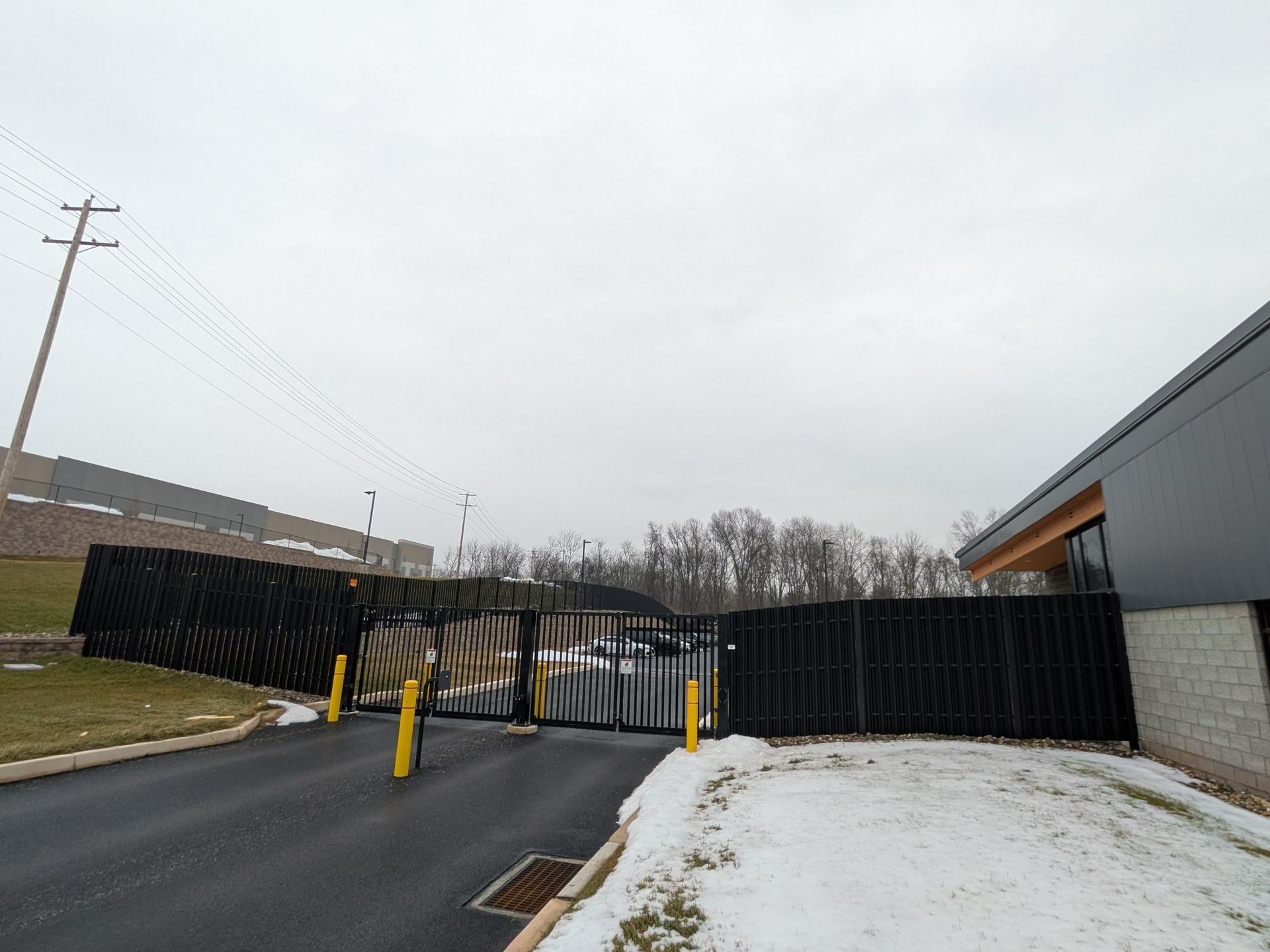 Steel semi-private fence installation in York PA and speed gate install by Millcreek Fence