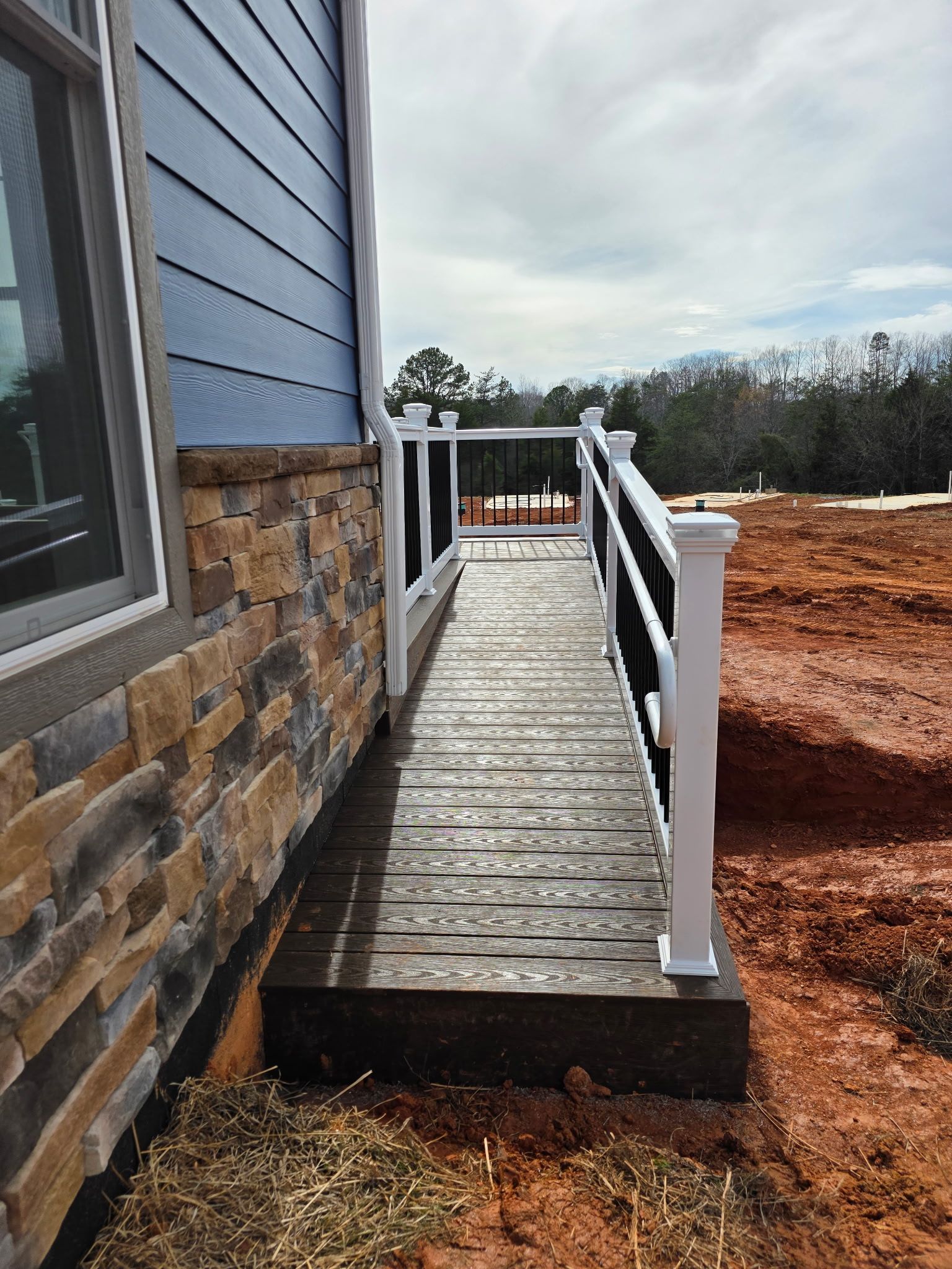 Vinyl railing system from Keystone Vinyl Technology installed on deck