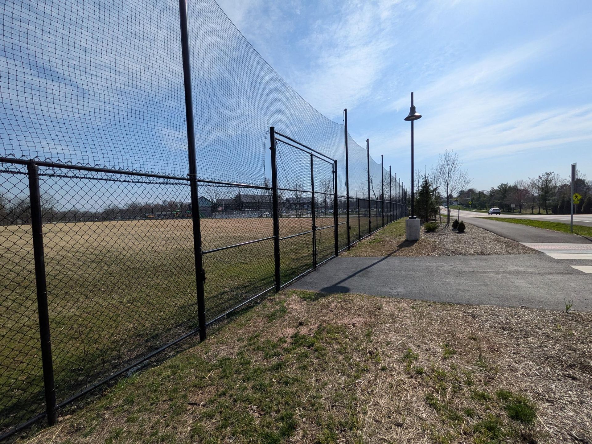 Commercial chain link fence installation for baseball field