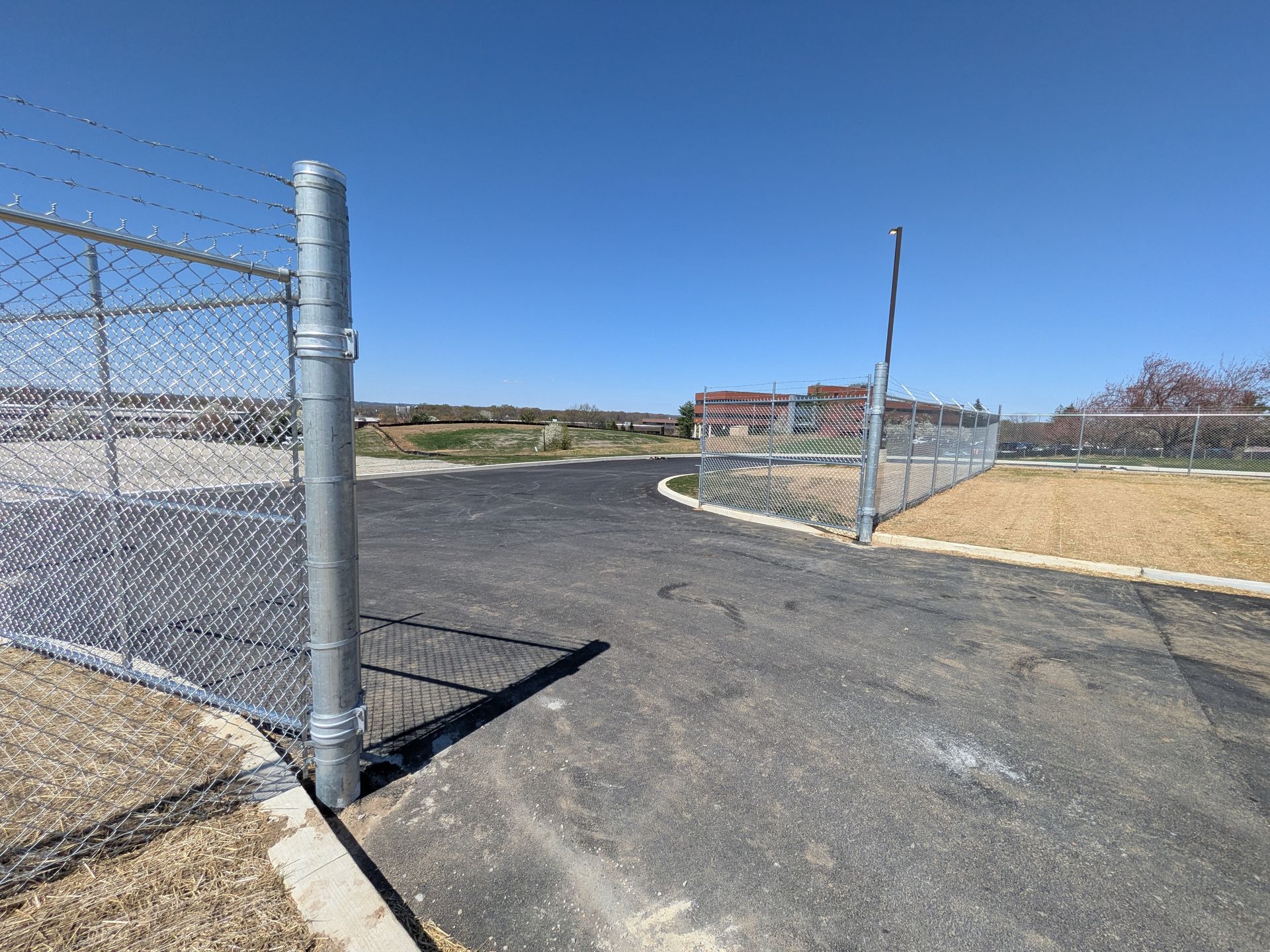 Chain link fencing installation by Millcreek Fence & Decks | Delaware Army National Guard