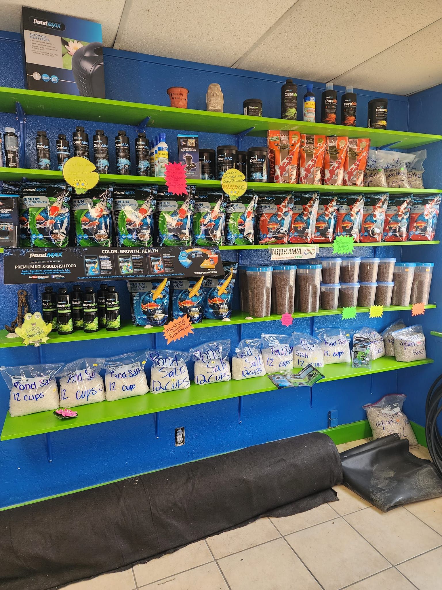 A store filled with lots of fish food on shelves