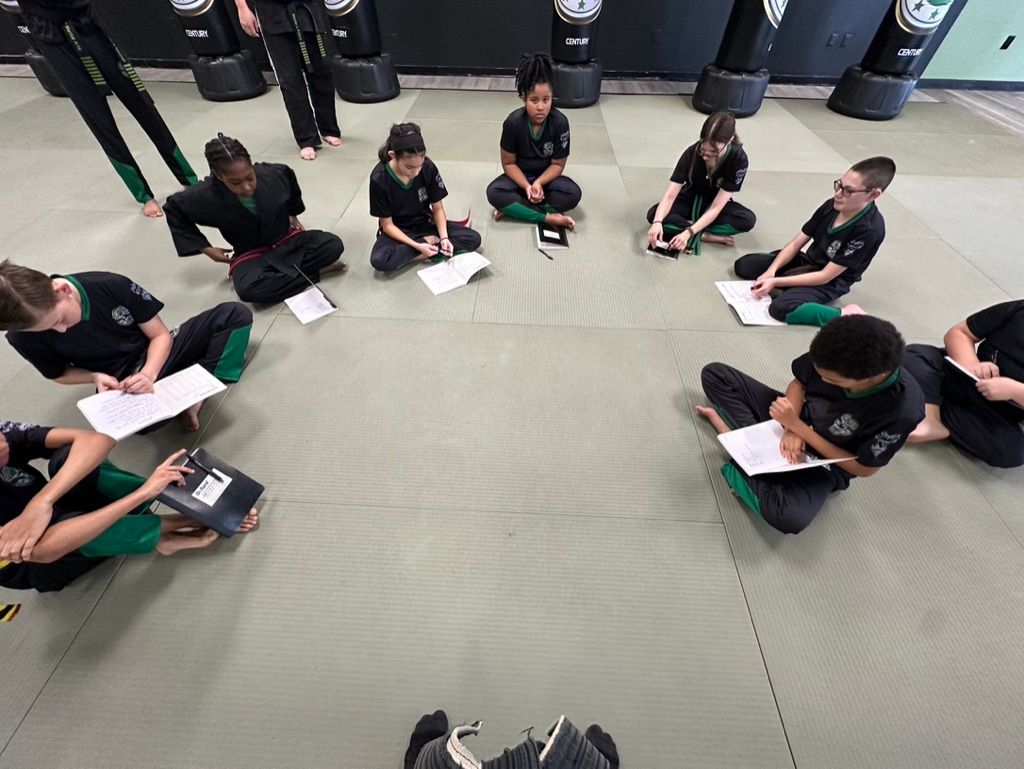 A blurry picture of a bunch of colorful lights on a dark background.