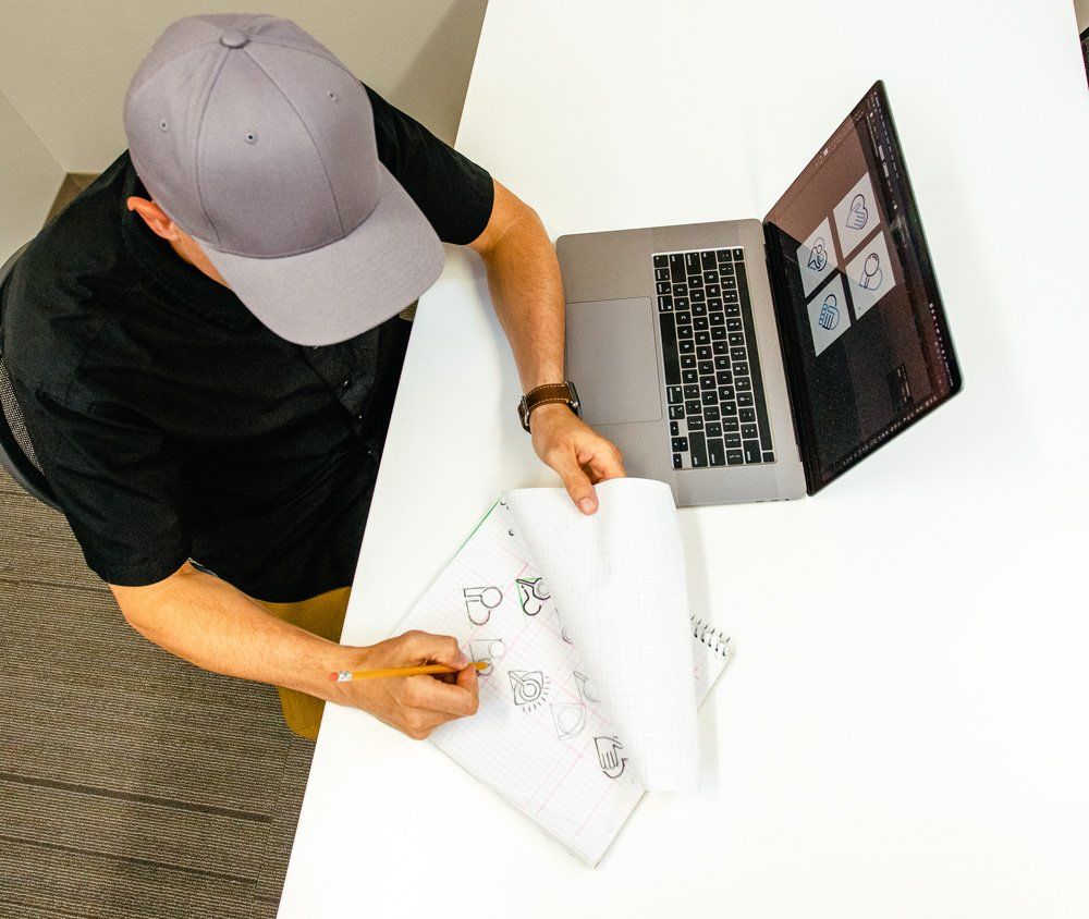 Shane designing logos