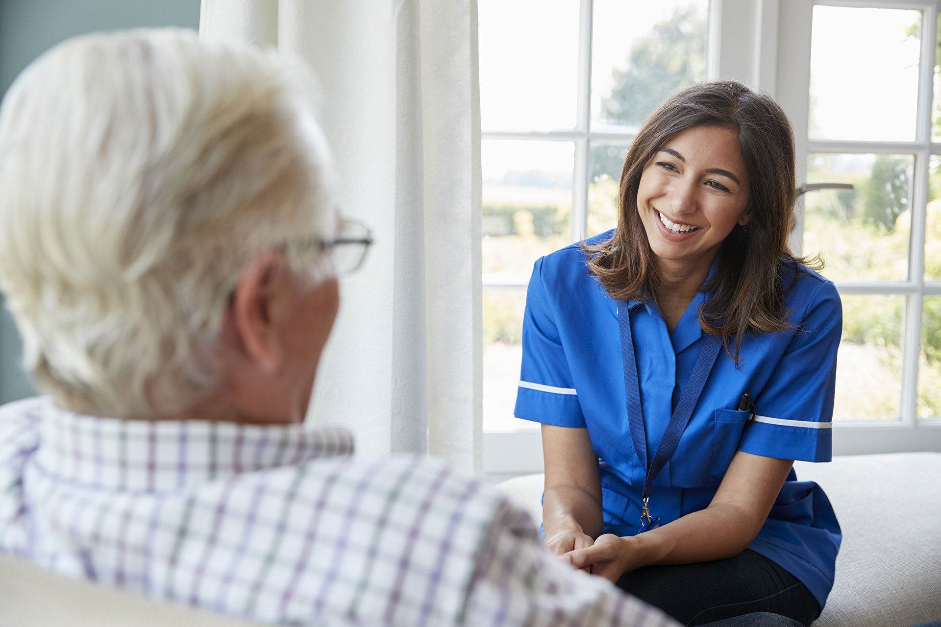 Adara employee smiling with a senior