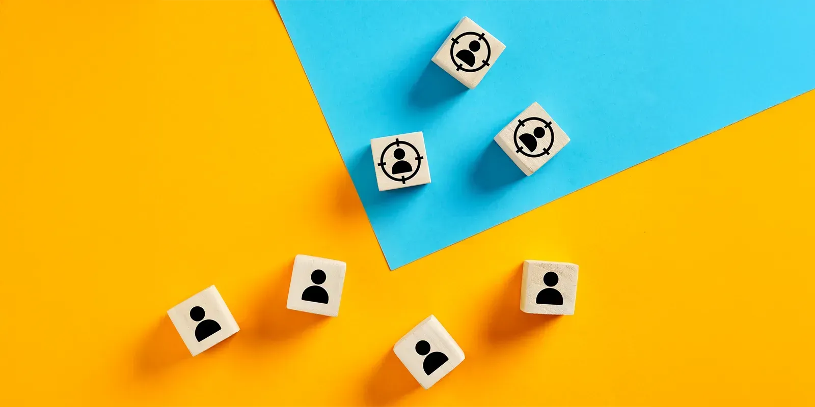 A group of dice with people on them on a yellow and blue background.