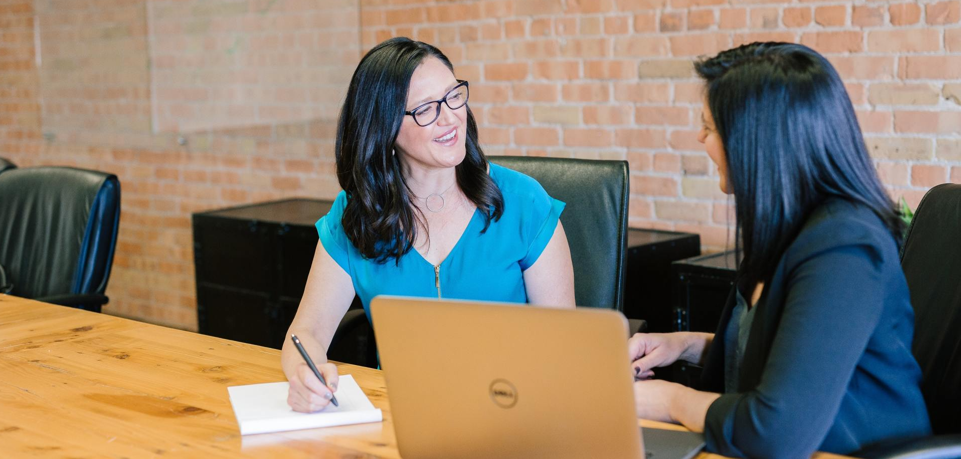 Woman interviewing another woman