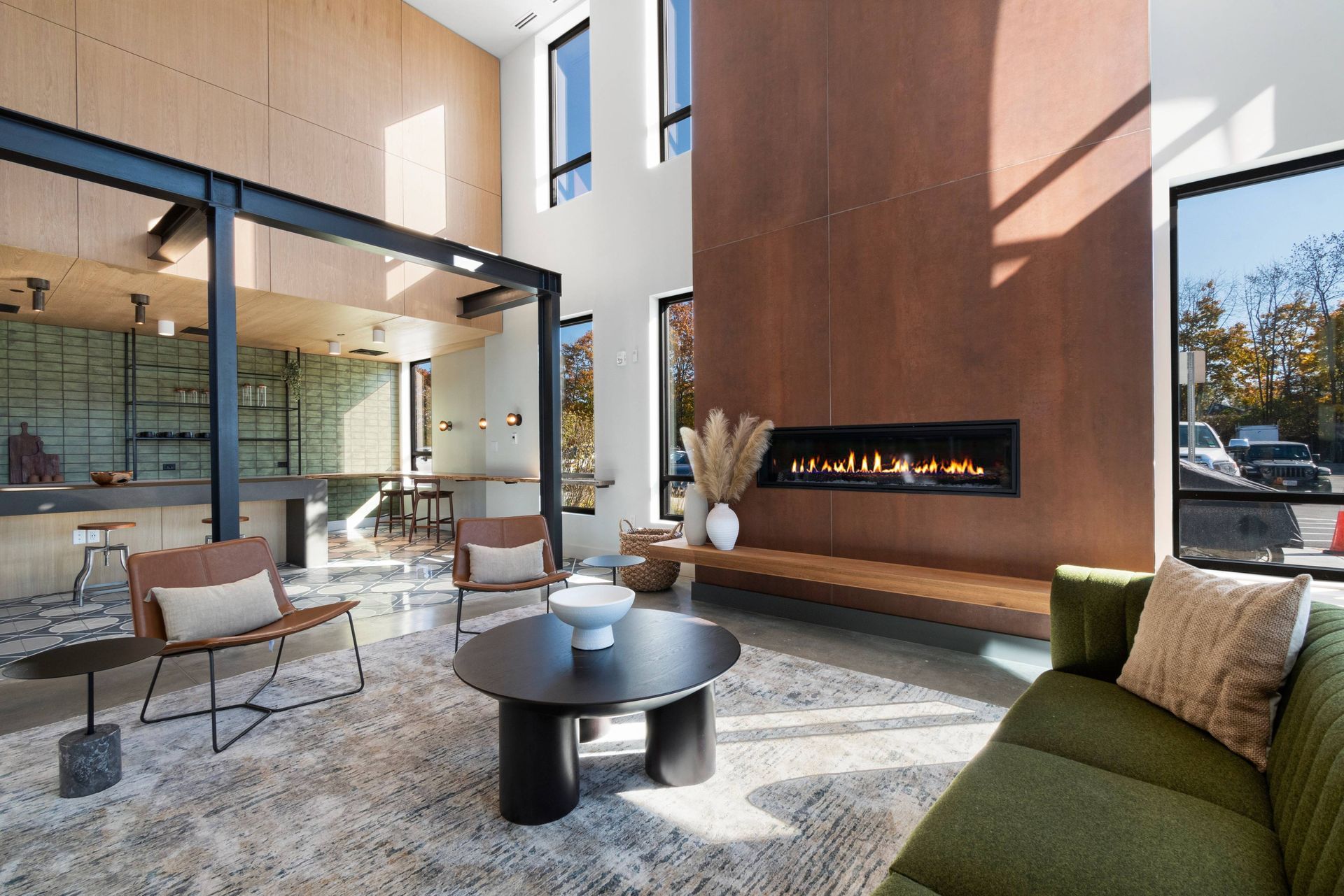 West End Yards clubhouse with fancy fire place and sofa.