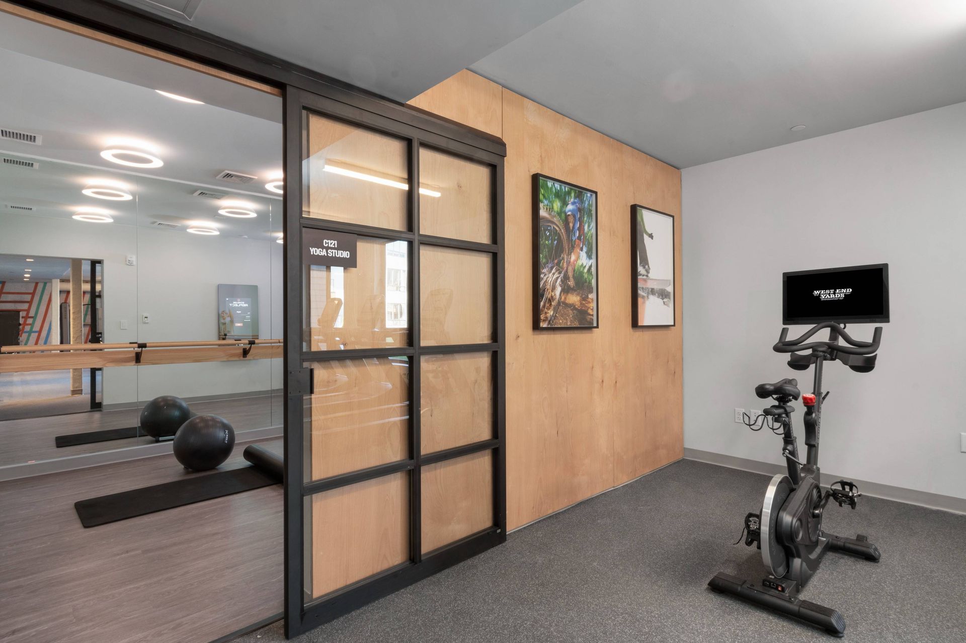 West End Yards modern fitness center with yoga room.