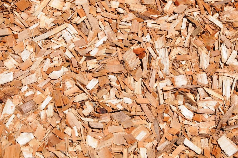 A Pile Of Wood Chips Is Sitting On The Ground — Mudgeeraba Landscape Centre In Mudgeeraba, QLD