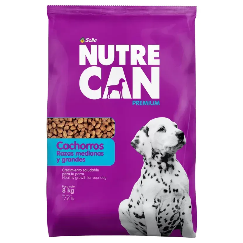 Bolsa morada de pienso para perros Nutre Can, “Cachorros” para razas medianas y grandes, con perro dálmata.